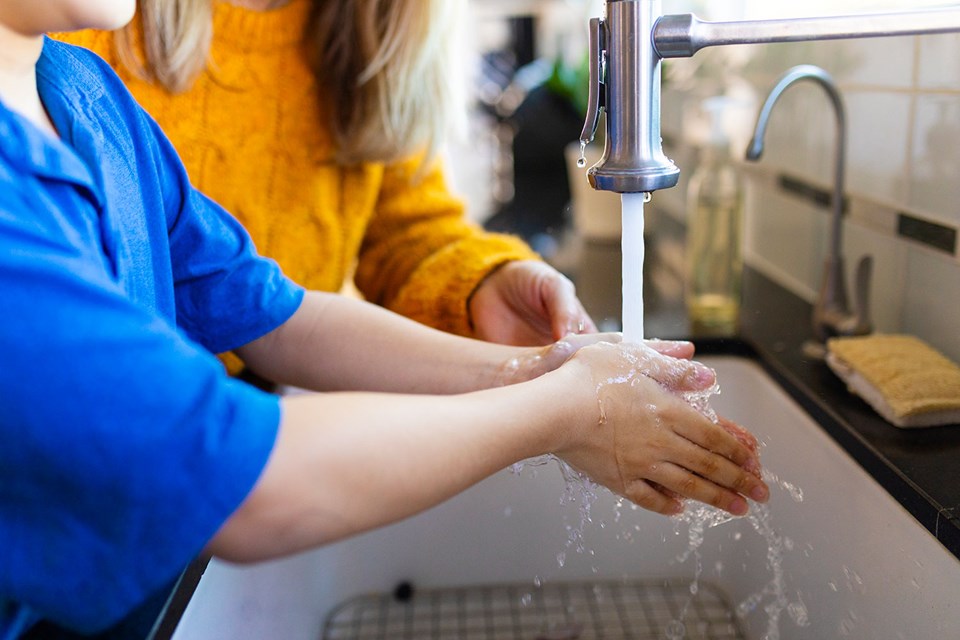 boy-washing-hands-new-normal (1)