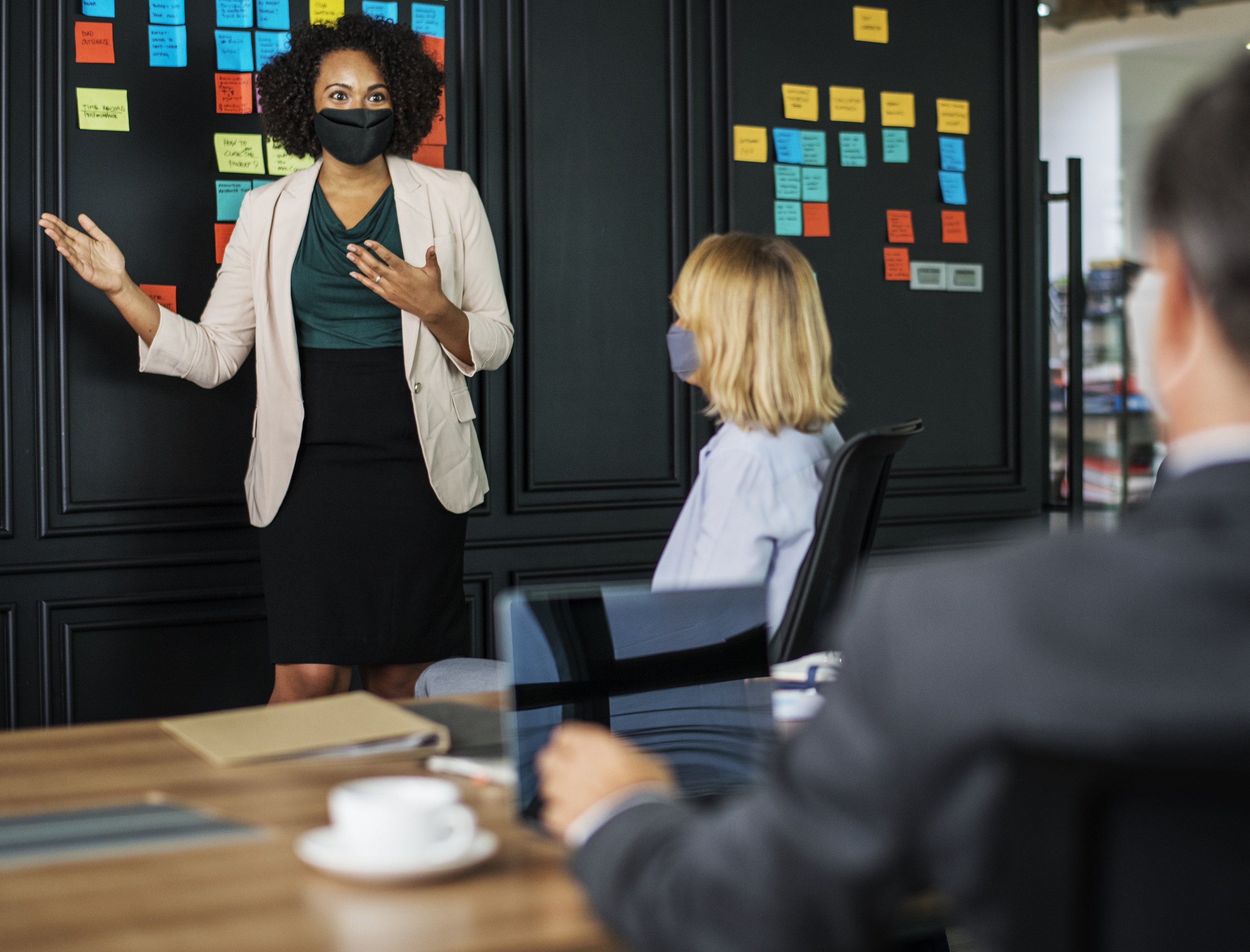 businesswoman-wearing-mask-in-coronavirus-meeting-the-new-normal