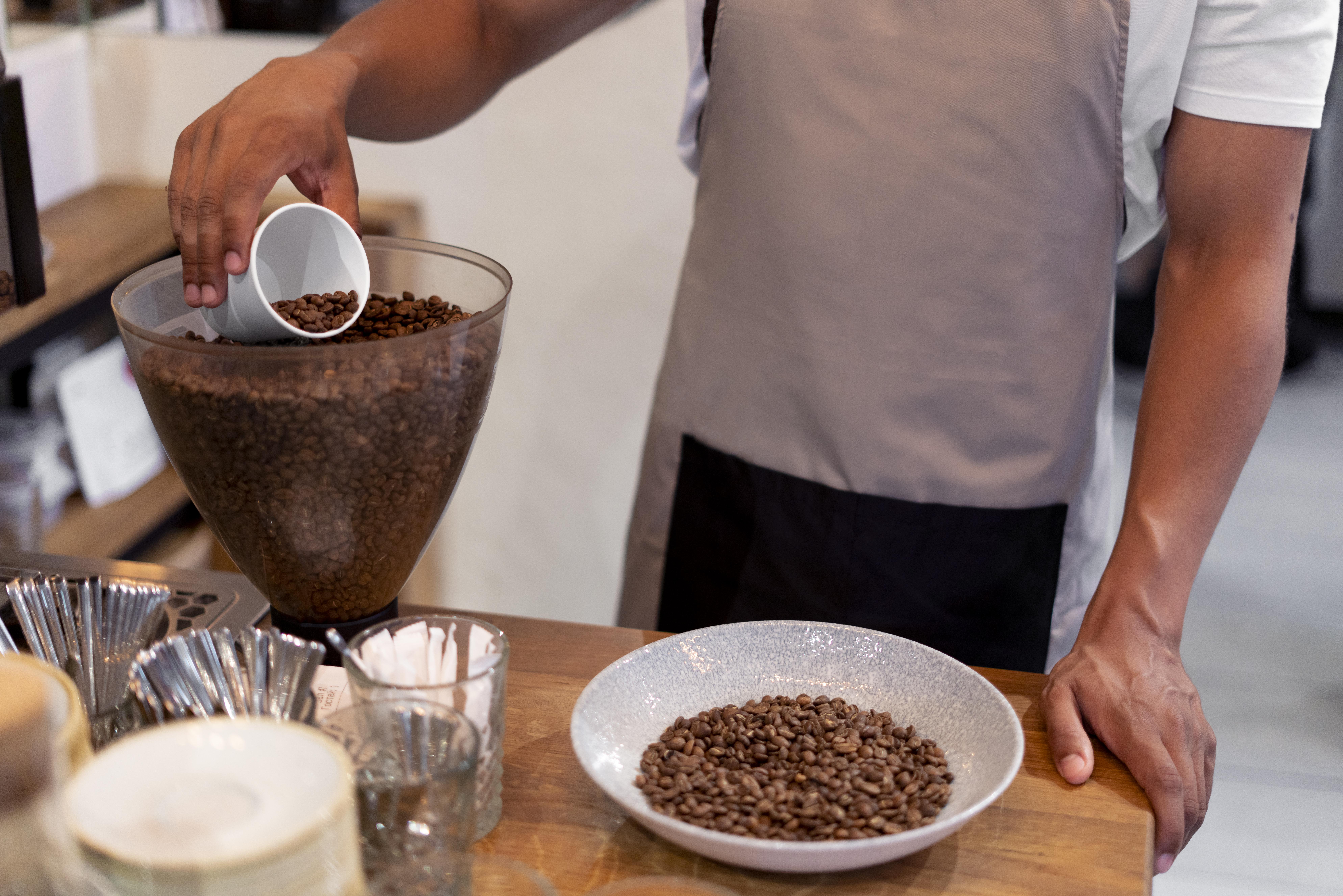 close-up-barista-preparing-coffee