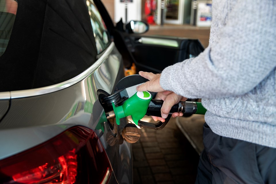 close-up-hand-pumping-gas-in-car (1)