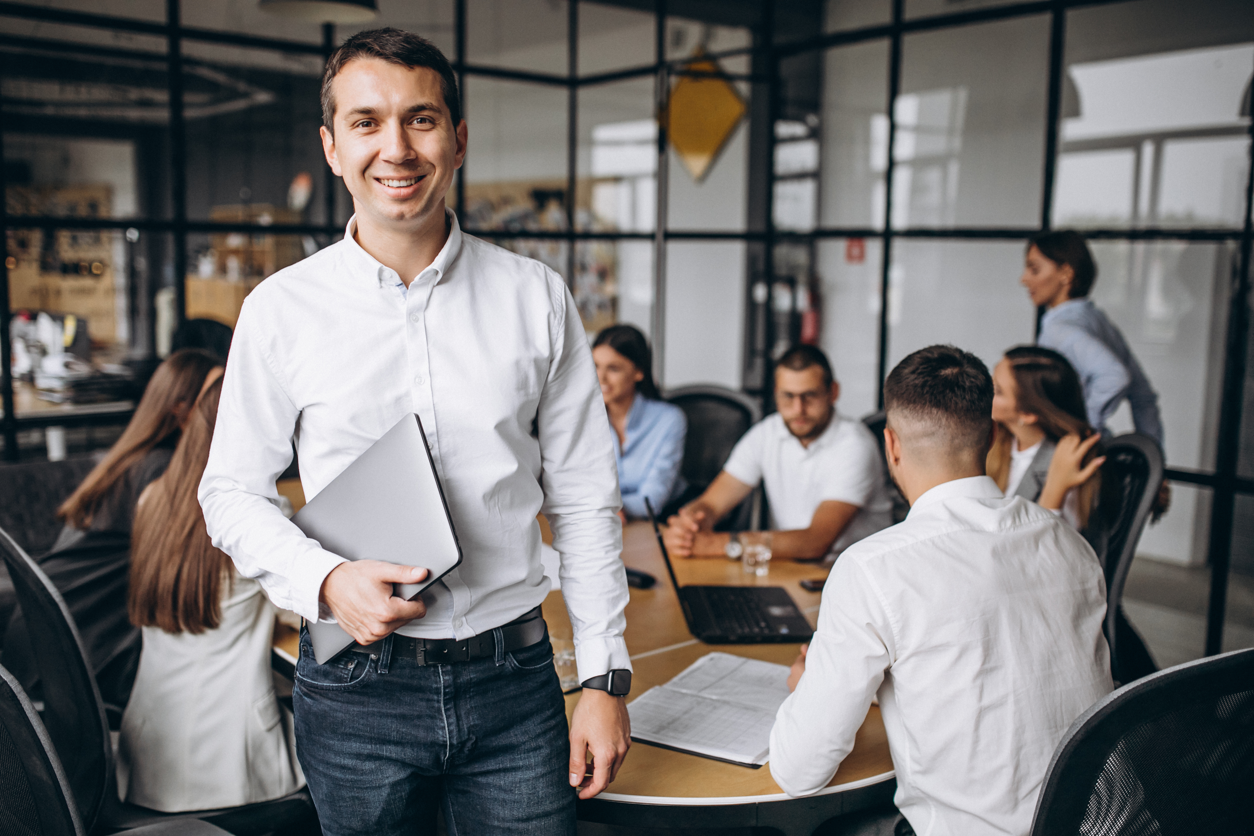 group-of-people-working-out-business-plan-in-an-office