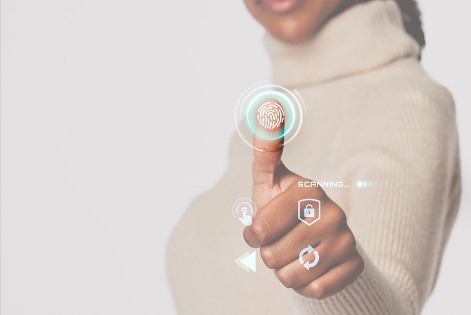 woman-scanning-fingerprint-with-futuristic-interface-smart-technology